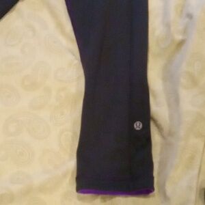 Size 4 Lululemon reversible yoga pants 3/4 leg length black and purple